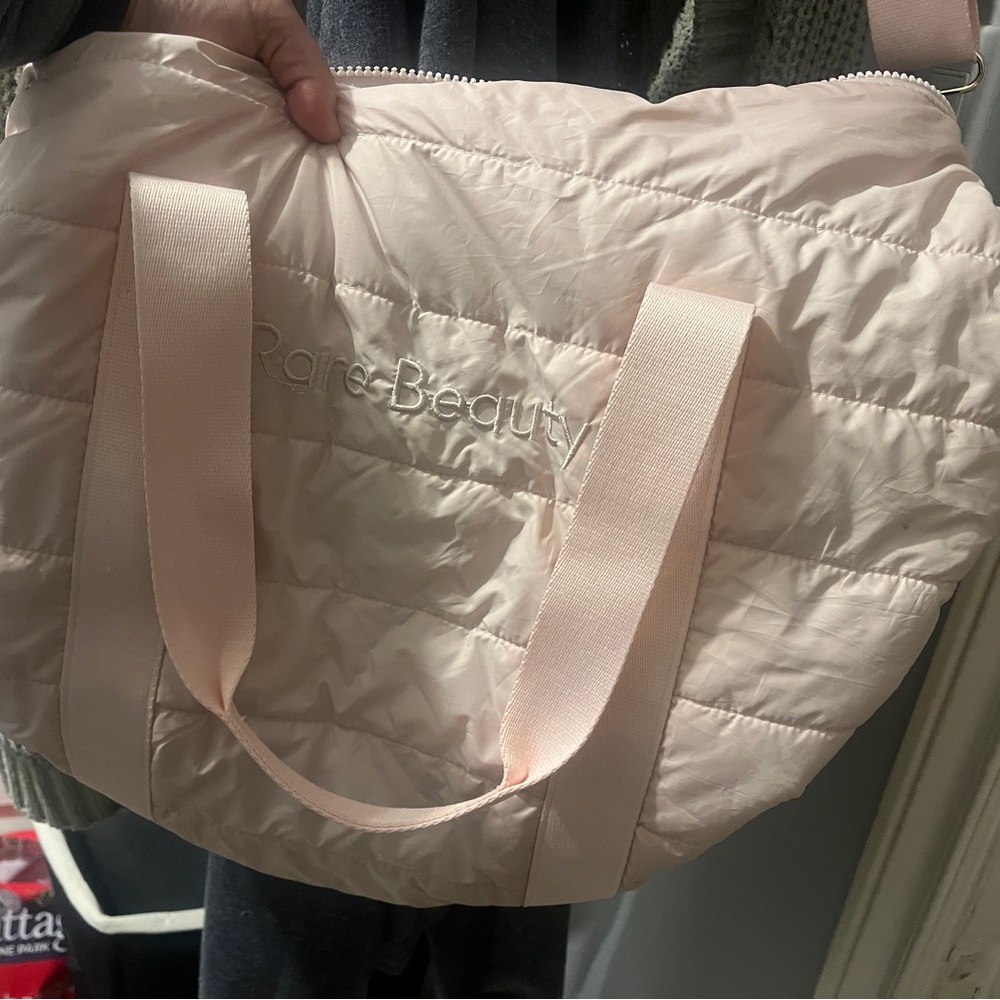 Rare by Selena Gomez pink duffle bag